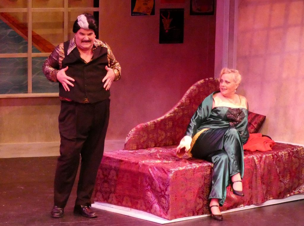 John B. Cooper as "Adolpho" and Nancy Hebert Bach in the titular role in TMP's "Drowsy Chaperone." Photo by Kat Dollarhide.