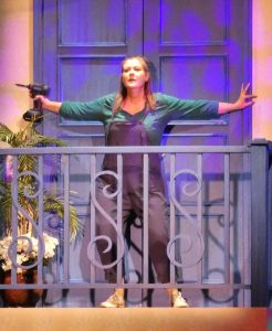 Linda Palacios taking care of building maintenance as Donna, in TMP's Mamma Mia.