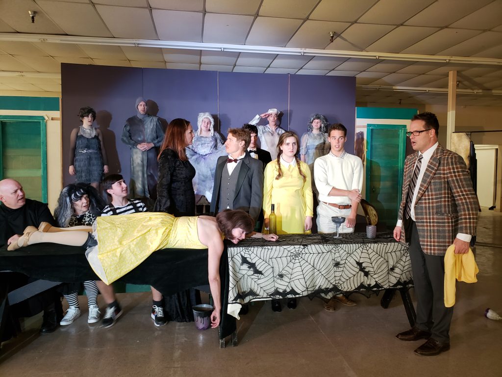 The ensemble cast of "The Addams Family" in rehearsal.
